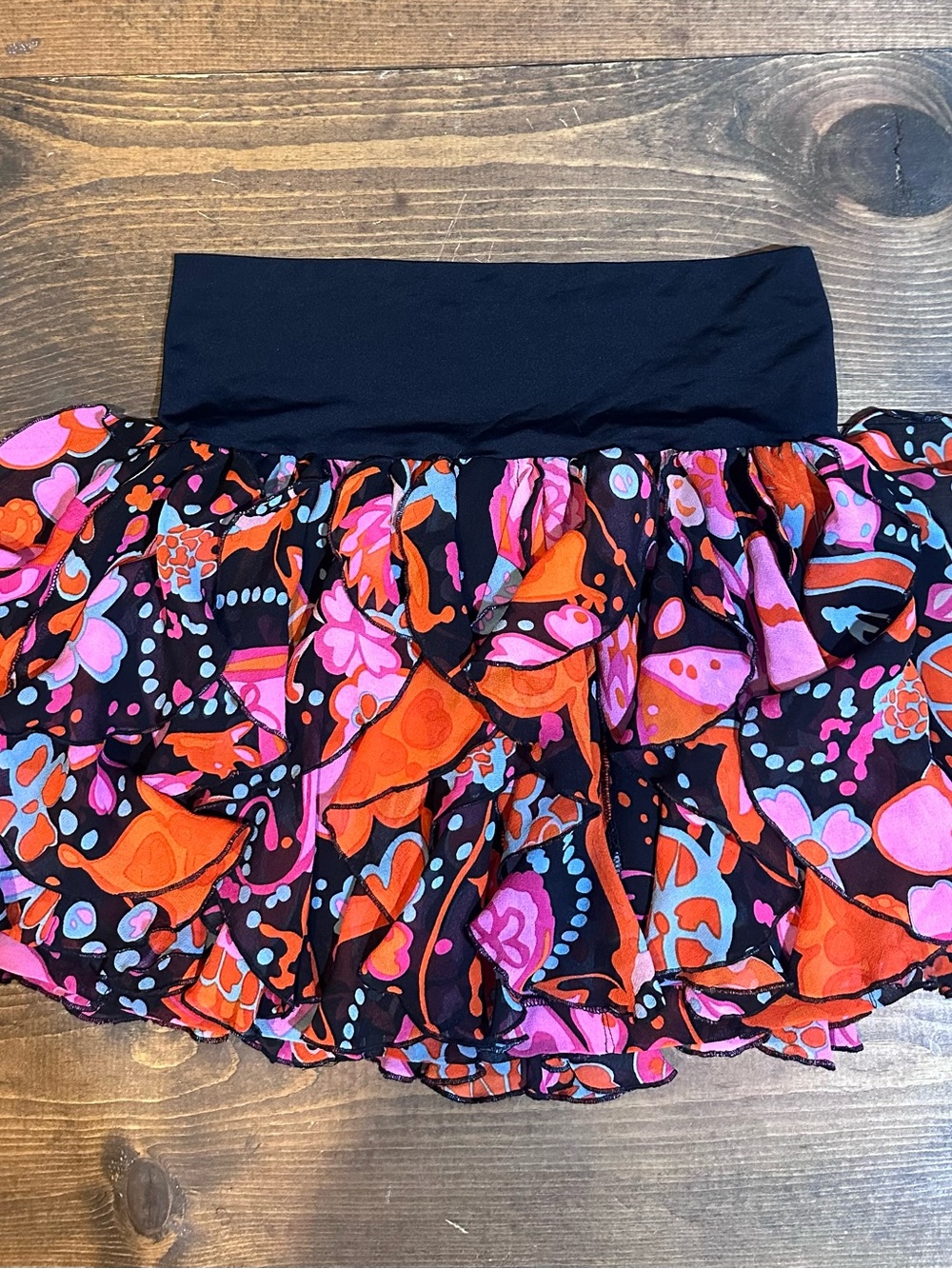 bebe Black Mini Skirt with Pink & Orange Floral Print